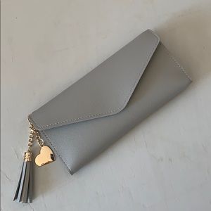 NWOT Grey wallet with charm